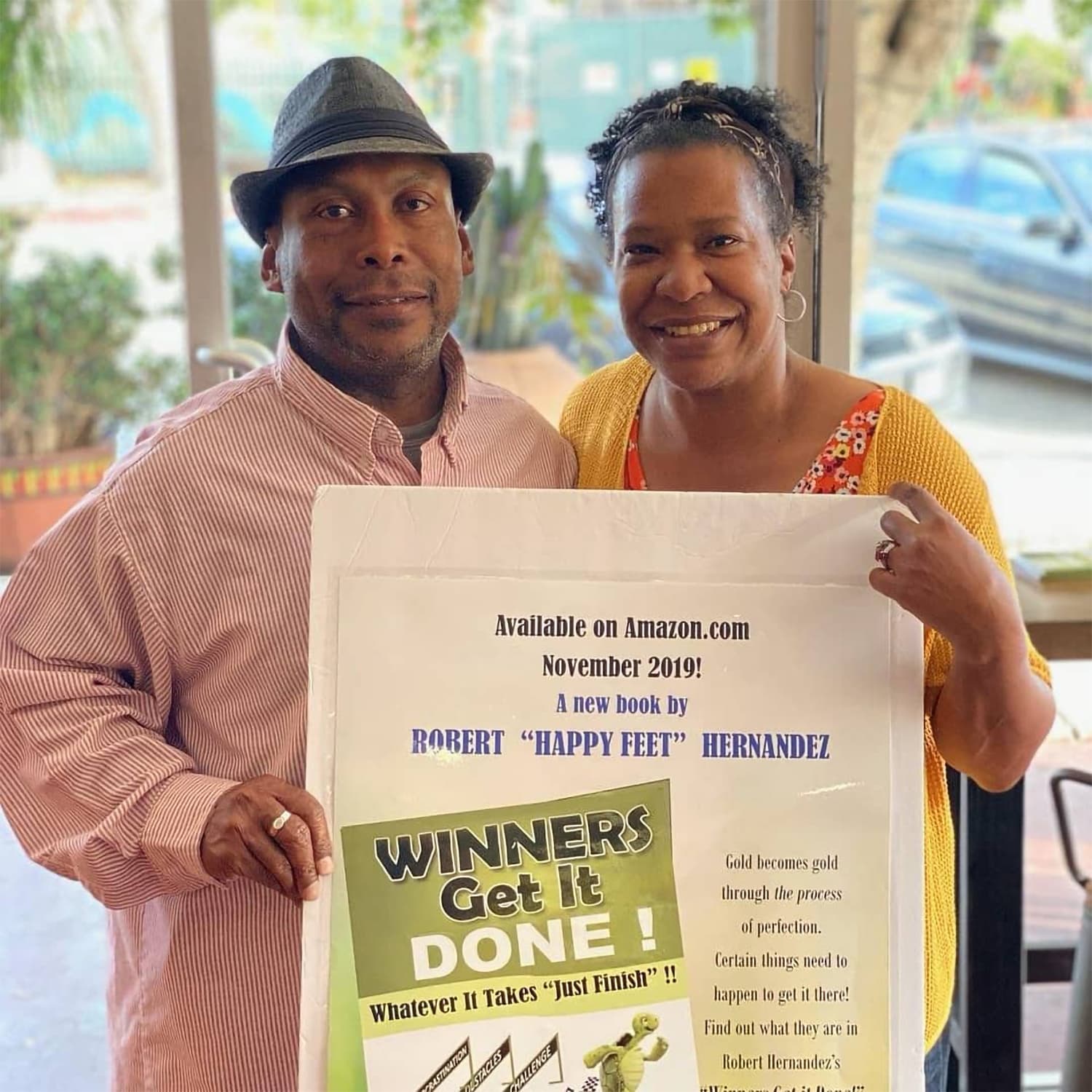 Reader holding Winners Get It Done